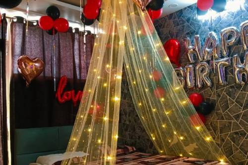 Romantic Birthday Room Decoration with Balloons and Fairy Lights in Ghaziabad