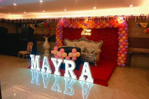 Vibrant Birthday Decor with Purple Pink and Yellow Theme in Ghaziabad